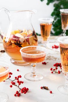 several glasses filled with different types of drinks