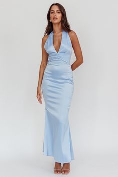 Satin maxi dress Deep V-neck Halterneck with long tie Backless No lining Invisible back zipper Can we take a moment for this dress? Our Italia Azure dress is sure to make jaws drop! We are obsessed with its buttery soft, satin fabric and flattering halter neckline. Perfect for any occasion where you really need to leave a lasting impression. Team it with heels and a clutch and watch heads turn. MODEL INFO Model is wearing size XS Height: 5'8" Bust: 31.0" Waist: 24.0" Hips: 35.0" CARE Hand Wash C Azure Dress, Light Blue Gown, Wedding Fits, Yellow Bridesmaid Dresses, Dress Light Blue, Yellow Bridesmaids, River Cruise, Pleated Bodice, Grad Dresses