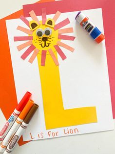 the letter l is for lion made with construction paper and crayons