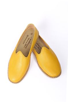 These canary yellow 100% handcrafted shoes, made from high-quality natural leather, will make you feel comfortable. Our authentic loafers, crafted with amazing craftsmanship, are not only a great gift for friends and family but also for yourself. The superior stitching style we use takes more time but reflects the quality we are proud of. Our traditional shoes are suitable for wearing both inside and outside. Wanna see more Charooq for men? Check out the link! https://www.etsy.com/your/shops/Cha Yellow Leather Slip-on Loafers, Yellow Leather Shoes With Round Toe, Yellow Leather Plain Toe Shoes, Yellow Leather Flats With Rubber Sole, Yellow Leather Slip-on Flats, Yellow Leather Shoes With Almond Toe, Yellow Flats With Leather Sole And Round Toe, Yellow Leather Flats With Round Toe, Yellow Round Toe Flats With Leather Sole