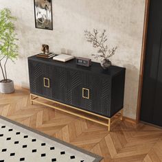 a living room with a black cabinet next to a door and a rug on the floor