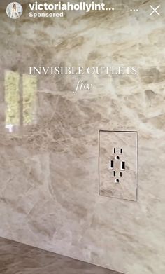 a bathroom with marble walls and flooring in the shower area is featured on instagram