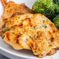 a close up of food on a plate with broccoli