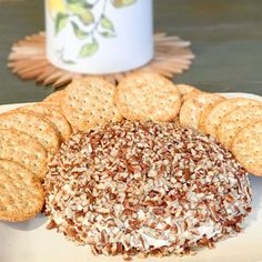 a plate with some crackers and cookies on it