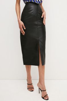 Made From Luxurious - And Responsibly Sourced - Leather, This Versatile Midi Skirt Makes A Directional Alternative To Your Favorite Denim Style. The Demure Pencil Silhouette Is Instantly Modernised By Seamed Detailing And A Central Hem Split - Just Add A Chunky Belt And Strappy Heels To Elevate The Piece For After Dark.This Garment Is Ready For The Future. It Is Made With Responsibly Sourced Leather From Tanneries Working To Reduce Their Environmental Impact. Sleek Leather Pencil Skirt, Modern Fitted Leather Skirt, Formal Fitted Leather Pencil Skirt, Sleek Fitted Leather Pencil Skirt, Sleek Knee-length Leather Skirt, Leather Knee-length Pencil Skirt For Fall, Fitted Leather Midi Skirt, Sleek Leather Pencil Skirt For Night Out, Fitted Leather Pencil Skirt In Modern Style