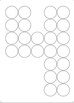 the letter k is made up of circles and has been drawn in black on white paper