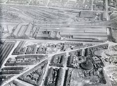 an aerial view of a city with lots of buildings