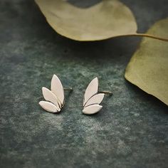 These sterling silver three petal post earrings highlight the subtle beauty of botanical forms. Event Menu, Subtle Beauty, Grit And Grace, Stained Glass Jewelry, Jewelry Tree, Crystal Decor, Halloween Jewelry, Glass Jewelry, Sales Gifts