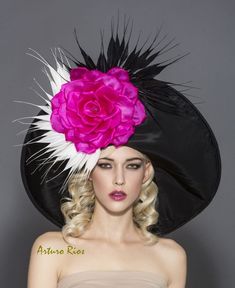 Rolled up brim Derby hat made on black taffeta, adorned with black and white pointy goose feathers and a Fuchsia silk rose. One size fits most. All my hats are hand made to order, please allow 1-2 weeks while we make and ship them. If this is a rush order, please contact me first to insure we can make it on time. All sales are final, feel free to contact me if you have any questions :) thank you Arturo :) White Derby Hat, Black Couture, Kentucky Derby Fascinator, Happy Hat, Derby Fascinator, Couture Hats, Crazy Hats, Kentucky Derby Hats