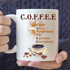 a woman holding a coffee mug with the words coffe on it