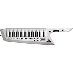 the electronic keyboard is white and has black keys on each side, as well as a long tail