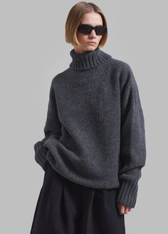 Color: Dark Grey Midweight wool blend fabric Oversized fit Turtleneck Drop shoulders Rib knit trim Small gem embellishment on the back Slip on style Unlined 70% Wool 30% Polyamide Hand Wash or Dry Clean By Sportmax. Imported Grey Swester Dress, Gray Dress Sweater, Dark Grey Cable Knit Sweater, Grey Turtleneck Outfit, Dark Grey Sweater, Knitted Sweater Dress, Oversized Grey Sweater, Turtleneck Outfit, Street Style Fall Outfits