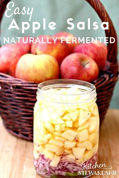 an apple salsa in a mason jar next to some apples