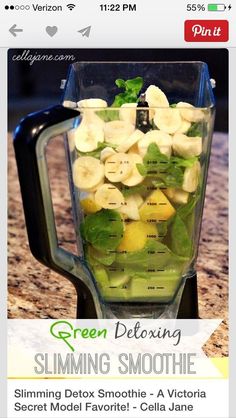 a blender filled with fruit and vegetables on top of a counter