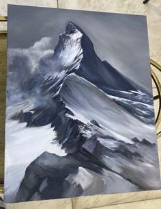 a painting of a mountain with snow on the top and clouds in the sky above it