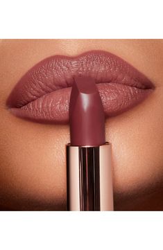 What it is: A magical, matte lipstick with a long-lasting, buildable, hydrating formula featuring 3D glow pigments to create lips that appear wider and fuller.What it does: This lipstick is exclusively enriched with Lipstick Tree extract, Charlotte's secret ingredient, and orchid extract to protect and soothe for a cashmere finish. How to use: Begin by applying lip liner, filling in the lips for added intensity. Then, apply Matte Revolution straight from the bullet for fuller, wider, lit-from-wi Pillow Talk Medium, Nude Pink Lipstick, Revolution Lipstick, Permanente Make-up, Pillow Talk Lipstick, Charlotte Tilbury Matte Revolution, Perfect Lipstick, Hydrating Lipstick, Lipstick Shade