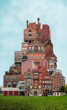 a very tall building with lots of windows and balconies on top of it