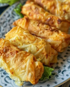 some food that is on a plate with lettuce and other foods in the background