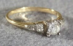 an image of a gold ring with diamonds on it