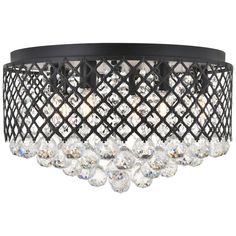 a chandelier with crystal beads hanging from the bottom and black metal trimming