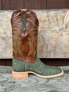 R. Watson presents these nubuck olive green caiman and vintage amber calf exotic western boots. These boots have a corded stitch pattern, R. Watson comfort system, all leather stacked heel, counters, solid steel shank, and 10 iron outsole. 13″ total in height. 13" Shaft Heel - Walking Toe - 2" Square Top - Cowhide Top Color - Vintage Amber Vamp - Caiman Belly Vamp Color - Olive Green R. Watson boots tend to run big. RESTRICTIONS ON SHIPMENT OF EXOTIC BOOTS NEW YORK (See N.Y. Envtl. Conserv. Law Green Western Boots For Rodeo, Western Green Snip Toe Boots, Green Leather Western Boots, Green Snip Toe Ranch Boots, Western Green Boots With Leather Sole, Western Store, Square Top, Cowgirl Western, Western Hats