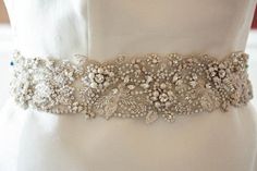 Beaded wedding dress belt Flora 27 to 28 Inches Made to Elegant Bedazzled Wedding Sash, Elegant Pearl Embroidered Bridal Accessories, Elegant Bridal Accessories With Pearl Embroidery, Elegant Embellished Sashes, Elegant Embellished Fitted Sashes, Elegant Embellished Fitted Sash, Elegant Fitted Embellished Sashes, Elegant Bridal Accessories With Pearl Embroidery For Ceremony, Silver Bedazzled Bridal Belt For Wedding