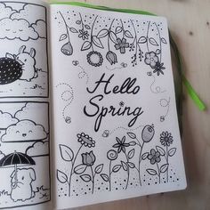 an open hello spring coloring book on a table