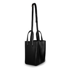 “Eight” large leather tote bucket bag X NIHILO’s DNA - Eight is the ultimate utility bag. Versatility and functionality are key elements of this beautiful bag. It can be worn in many different ways, fits a 13” laptop and A4 documents. Made from supple leather, this substantial piece has a black-lined interior with card and phone pockets. Defined by its fluid lines and unrestrained structure, our Eight bags will be your everyday best friend. Easy to style and practical, this will be your best inv Slow Fashion Movement, Utility Bag, Large Leather Tote, Work Bag, Australian Fashion, Best Investments, Beautiful Bags, Nappa Leather, New Bag