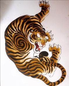 a paper cut out of a tiger with its mouth open