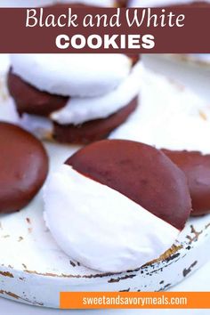 a wooden board with black and white cookies