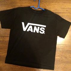 Size Small Black Vans Tee, And Never Worn, Just Tried On One Time. Purchased This From Vans Directly, And It's So Nice! Size Small. Vans Black Crew Neck T-shirt, Black Vans Crew Neck T-shirt, Black Crew Neck T-shirt By Vans, Black Casual School Tops, Casual Black Tops For School, Black Summer Tops For School, Vans Black Graphic Tee, Black Vans Crew Neck Top, Black Crew Neck Vans Top