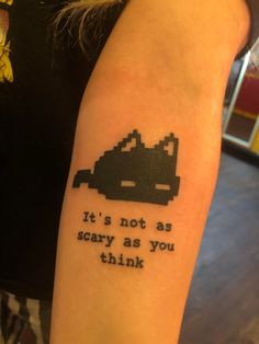 a person with a tattoo on their arm that says it's not as scary as you think