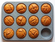 muffins in a baking pan on a table