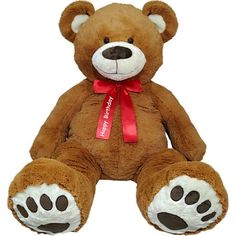 a brown teddy bear with a red ribbon around its neck