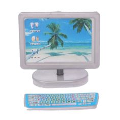 a small computer with a keyboard and mouse on the side, in front of a white background