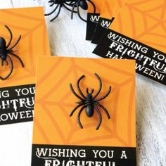 three halloween cards with black and orange spider on them