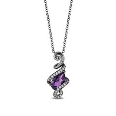 Enchanted Disney Villains Ursula Amethyst and 1/10 CT. T.W. Diamond Pendant in Sterling Silver with Black Rhodium - 19" Villain Jewelry, Enchanted Disney, Enchanted Disney Fine Jewelry, Disney Fine Jewelry, Amethyst Birthstone, Disney Villain, Amethyst Jewelry, Green Quartz, Station Necklace