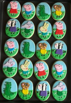 the cookies are decorated with farm animals on them