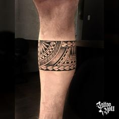 a man with a tattoo on his leg