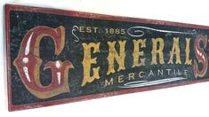 an old sign for general's mercantiles on the side of a building