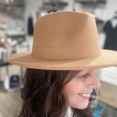 This product is available for in-store pick up only. Urban or rural, formal or casual, this 100% wool Felt Hat can be worn anywhere and everywhere! Our versatile, in-house design comes in five stunning colors, so you are sure to find one that you love. Our Felt Hat comfortably fits heads measuring 22" to 23.5", and is ethically made in a factory where workers are provided dignified work and wages. Classic Felt Hat For Fall, Classic Felt Hat For Everyday Fall Wear, Fall Wool Beige Fedora, Fall Beige Wool Fedora, Fitted Everyday Fall Hats, Fall Beige Flat Brim Hat, Beige Flat Brim Hat For Fall, Beige Wool Felt Hat For Fall, Classic Beige Hat Bands For Fall