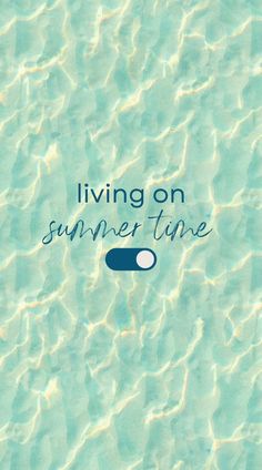 the words living on summer time written in blue and green water with small waves around it