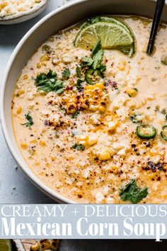 creamy and delicious mexican corn soup in a white bowl