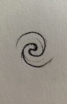 the letter s is drawn in black ink on white paper, and it appears to be made