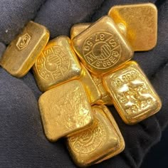 gold bars are stacked on top of each other