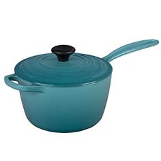 a blue casserole with a black lid