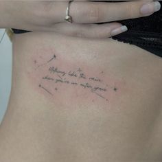 a woman's stomach with a tattoo saying nothing like the reason where you are in love