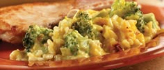 broccoli and macaroni on a plate with bread