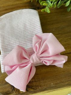 Welcome to The Tiny Blessings Boutique!  This listing is for our soft newborn hats -they are perfect for your new little bundle! They fit your little one's head snug and keep them warm.  A bow is added for just the perfect girly touch!  Make sure to follow us on social media and share photos of your little sweetie wearing TBB to win a $25 gift card from our monthly drawing! Facebook: www.facebook.com/thetinyblessingsboutique Instagram: @tinyblessingsboutique Thanks for looking and have a great d Cute Soft Pink Hat, Adjustable Soft Hat For Gifts, Adjustable Soft Hat As A Gift, Soft Adjustable Hat As A Gift, Cute Soft Hats For Gifts, Cute Soft Adjustable Hats, Cute Soft Hats Perfect As Gifts, Cute Pink Cotton Bonnet, Pink Cotton Beanie (one Size Fits Most)