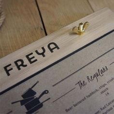 there is a wooden sign that says freya on the front and back of it